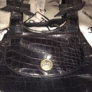 Gianni Versace hand bag in black w gold beautiful